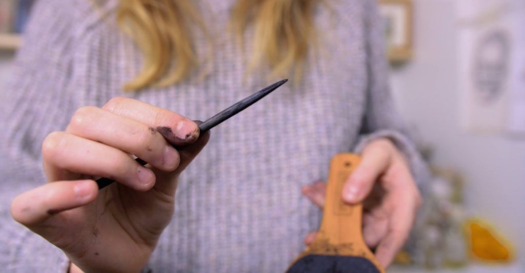 How do you sharpen a charcoal stick?